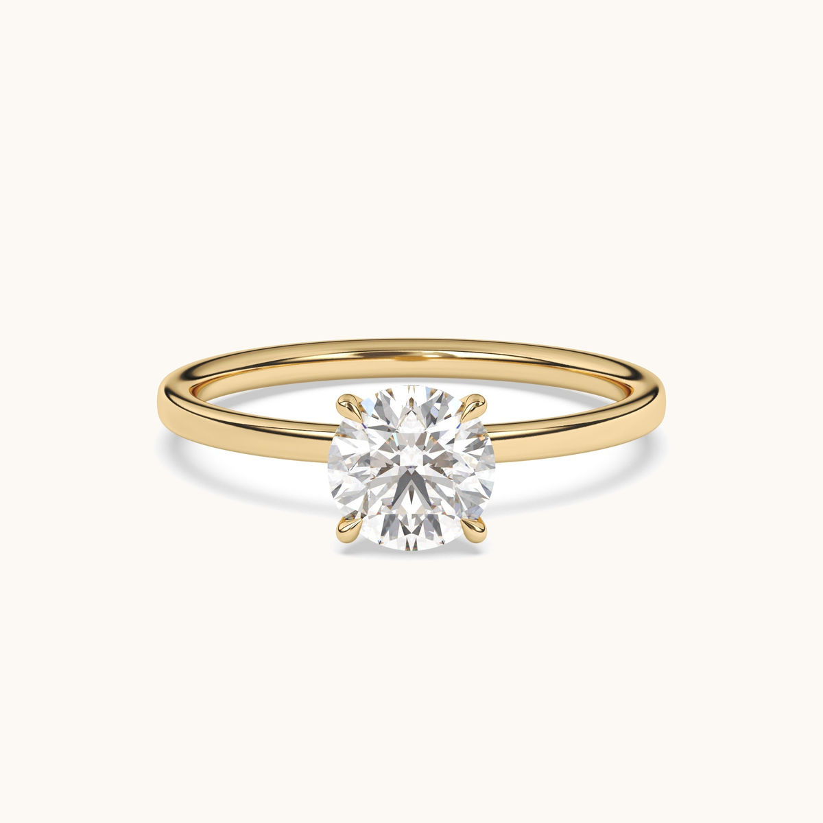 Round brilliant lab-grown diamond solitaire ring in yellow gold, low side profile