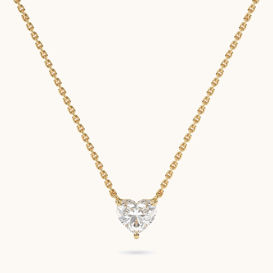 Heart-shaped lab-grown diamond pendant on a yellow-gold chain, full front view