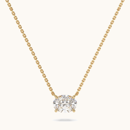 Oval lab-grown diamond pendant on a yellow-gold chain, full front view