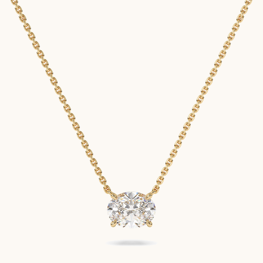 Oval lab-grown diamond pendant on a yellow-gold chain, full front view