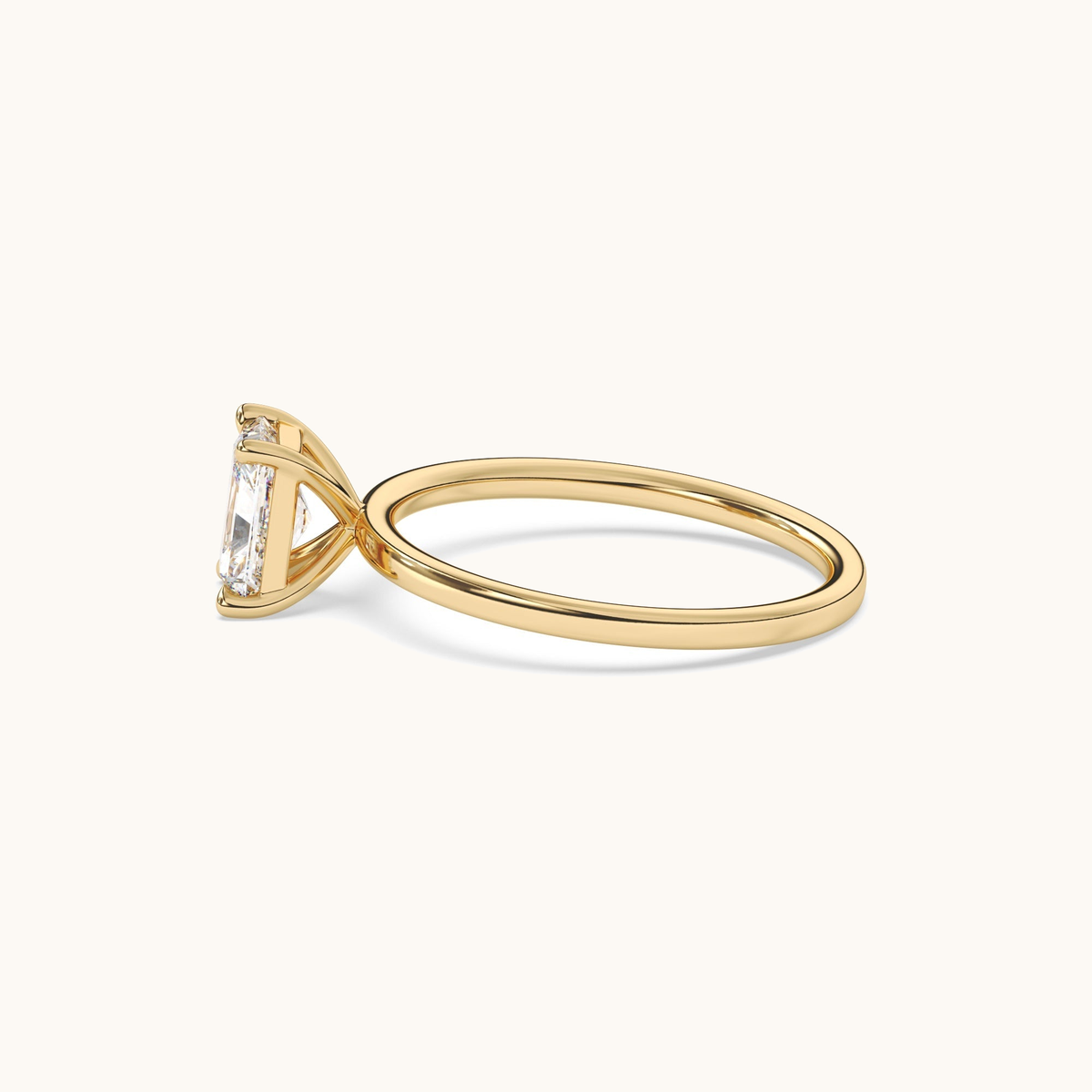 Radiant-cut lab-grown diamond solitaire ring in yellow gold, low front view
