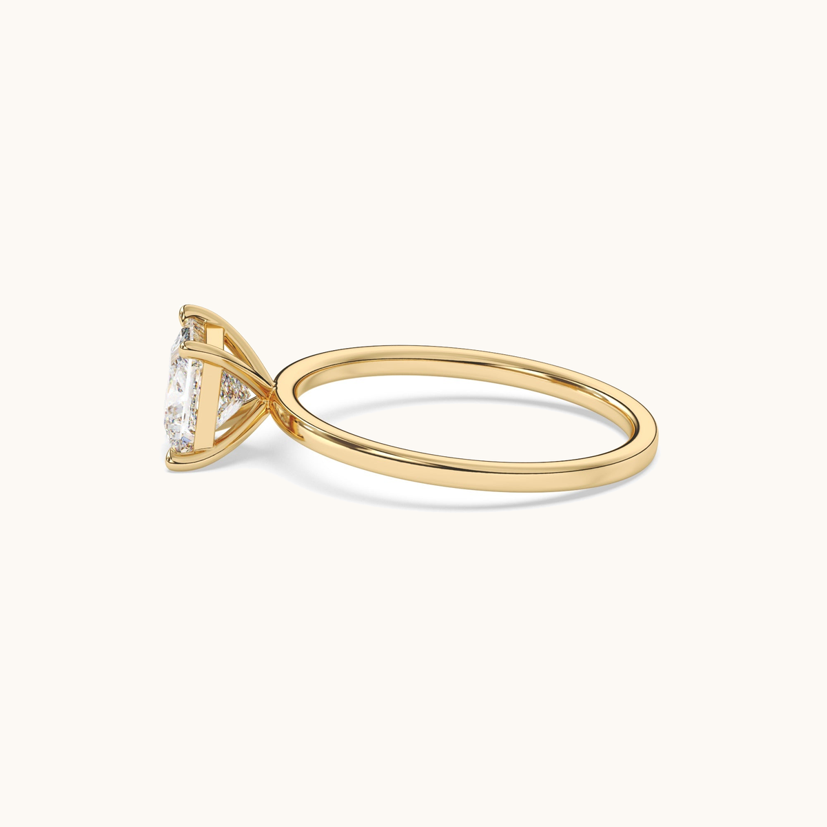 Princess-cut lab-grown diamond solitaire ring in yellow gold, low front view
