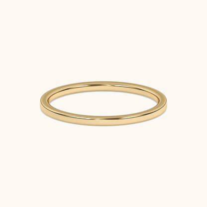 Slim 1.5mm Signature Band in 18k yellow gold, low front view
