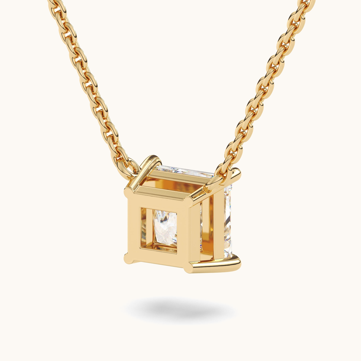Princess-cut lab-grown diamond pendant on a yellow-gold chain, rear view of the open-backed setting