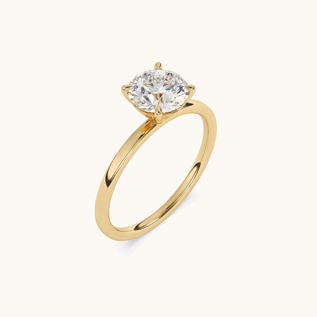 Round brilliant lab-grown diamond solitaire ring in yellow gold, angled upright view