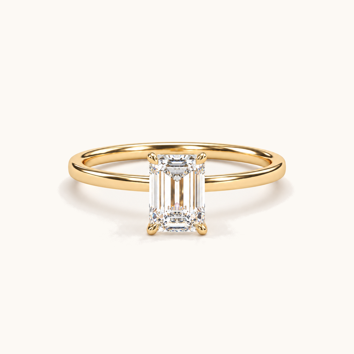 1ct emerald-cut solitaire in 18k Yellow Gold