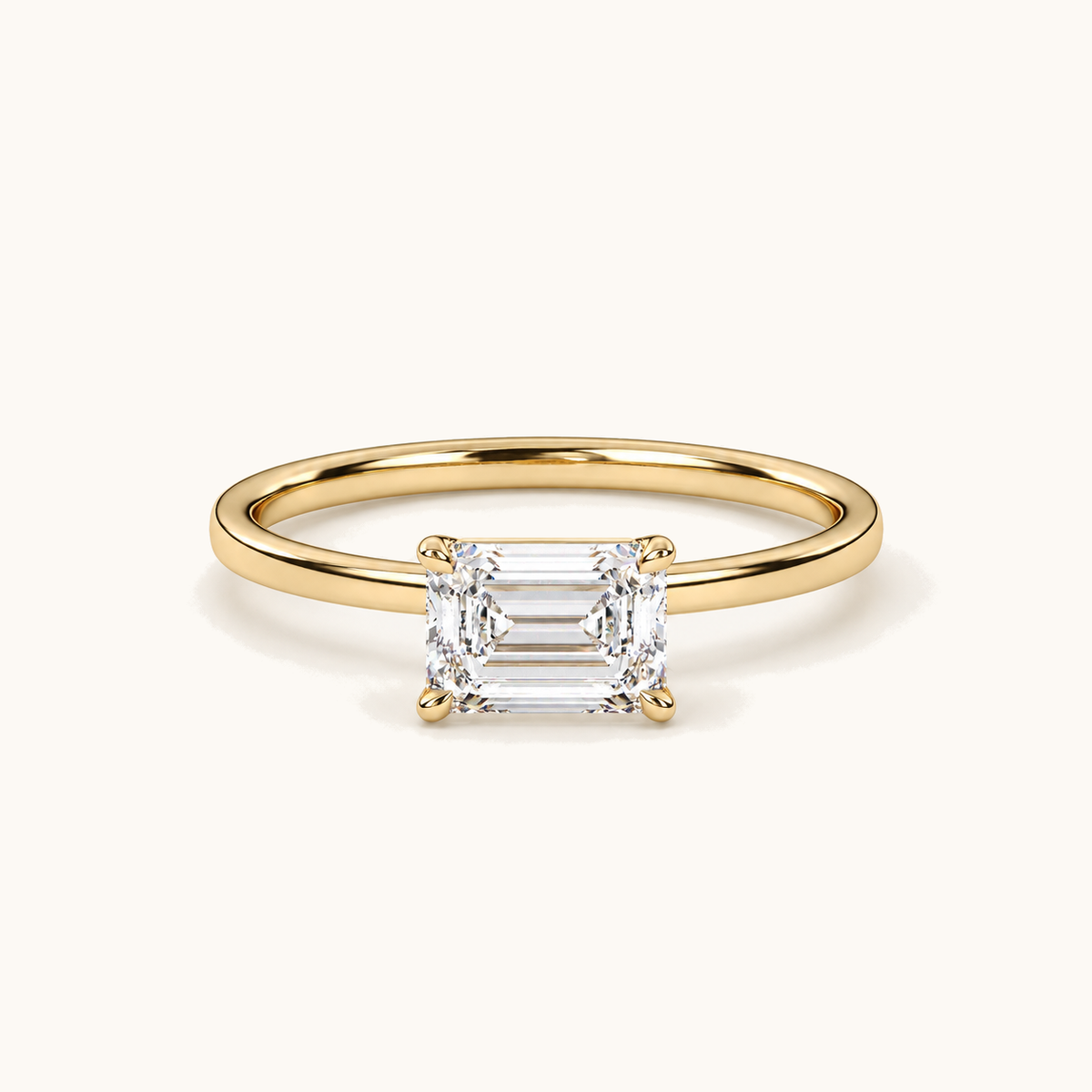 1ct landscape emerald-cut solitaire in 18k Yellow Gold