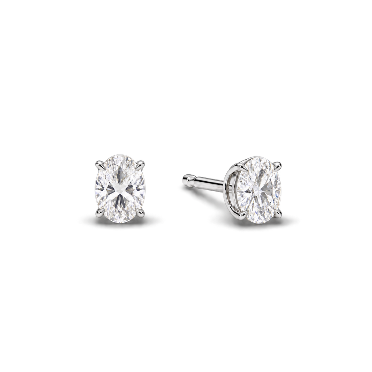 Oval diamond earrings, 1ct total pair weight, white-metal, angled; RB setting style
