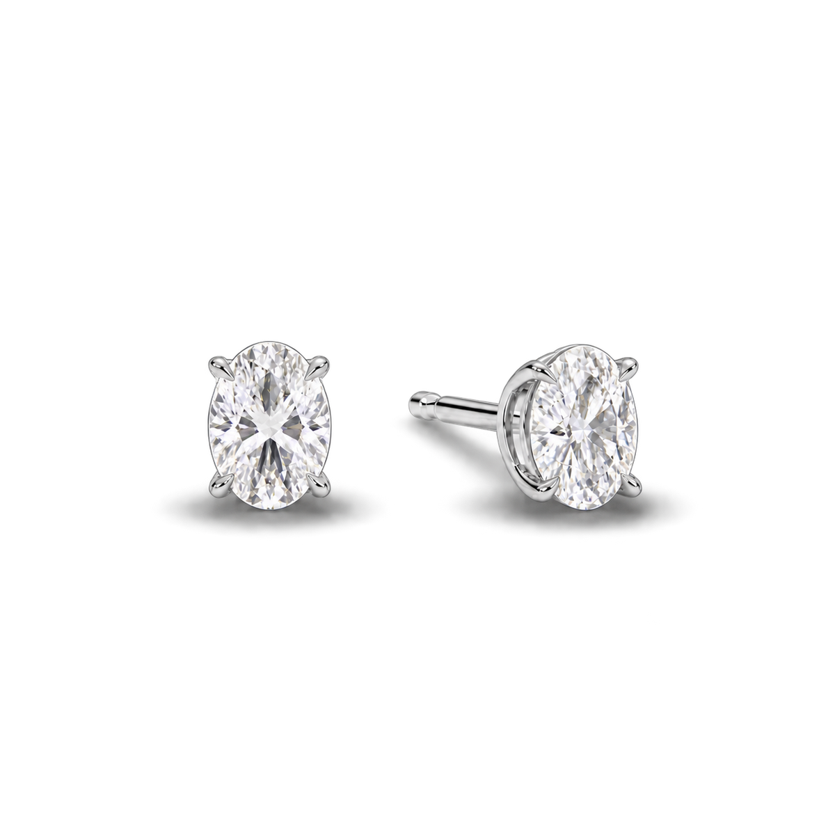 Oval diamond earrings, 1.5ct total pair weight, white-metal, angled; RB setting style