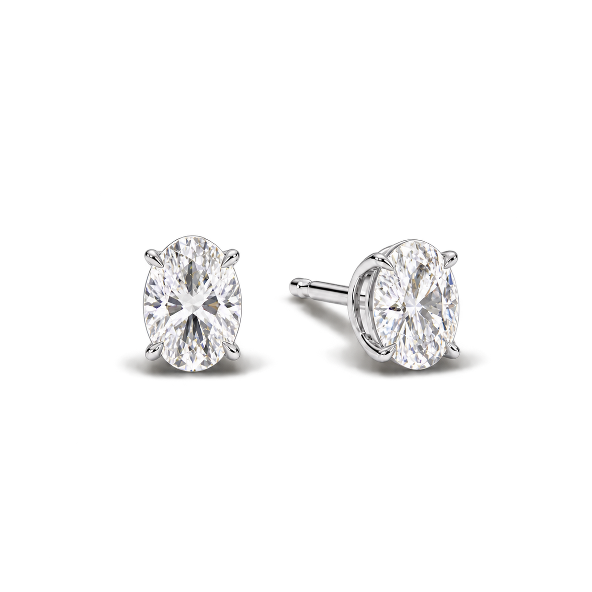 Oval diamond earrings, 2ct total pair weight, white-metal, angled; RB setting style