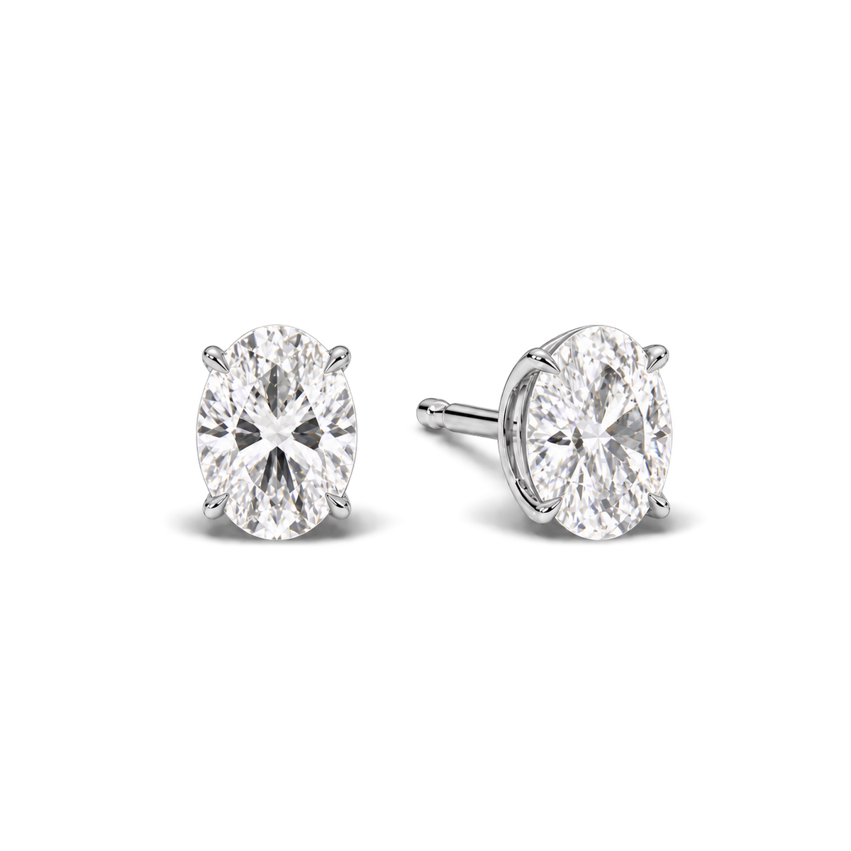 Oval diamond earrings, 3ct total pair weight, white-metal, angled; RB setting style