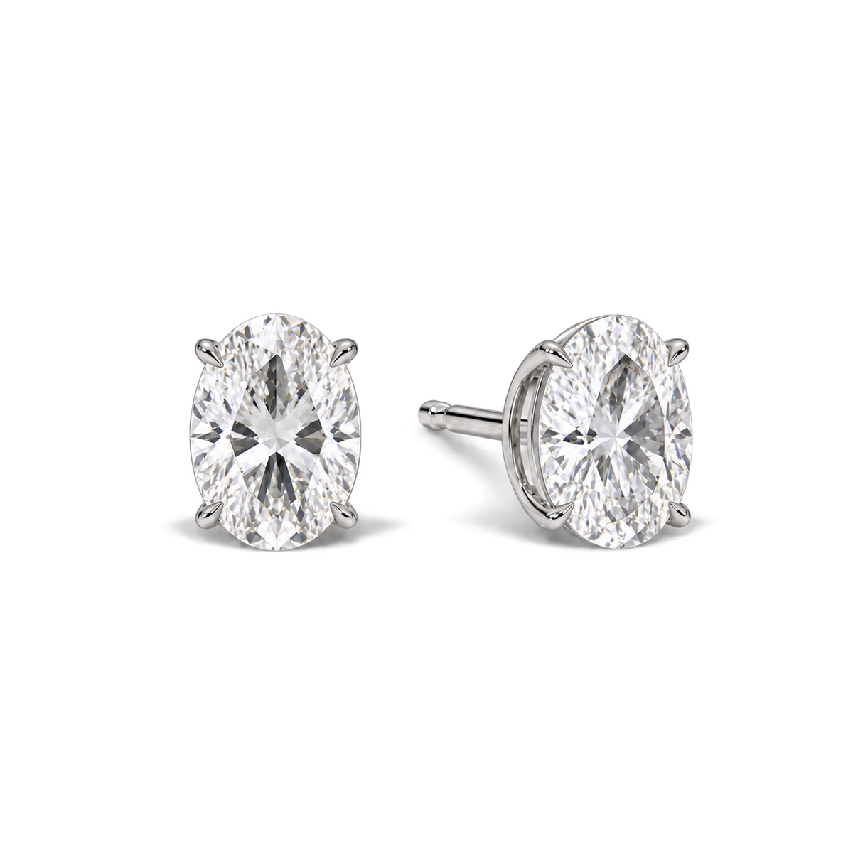 Oval diamond earrings, 4ct total pair weight, white-metal, angled; RB setting style