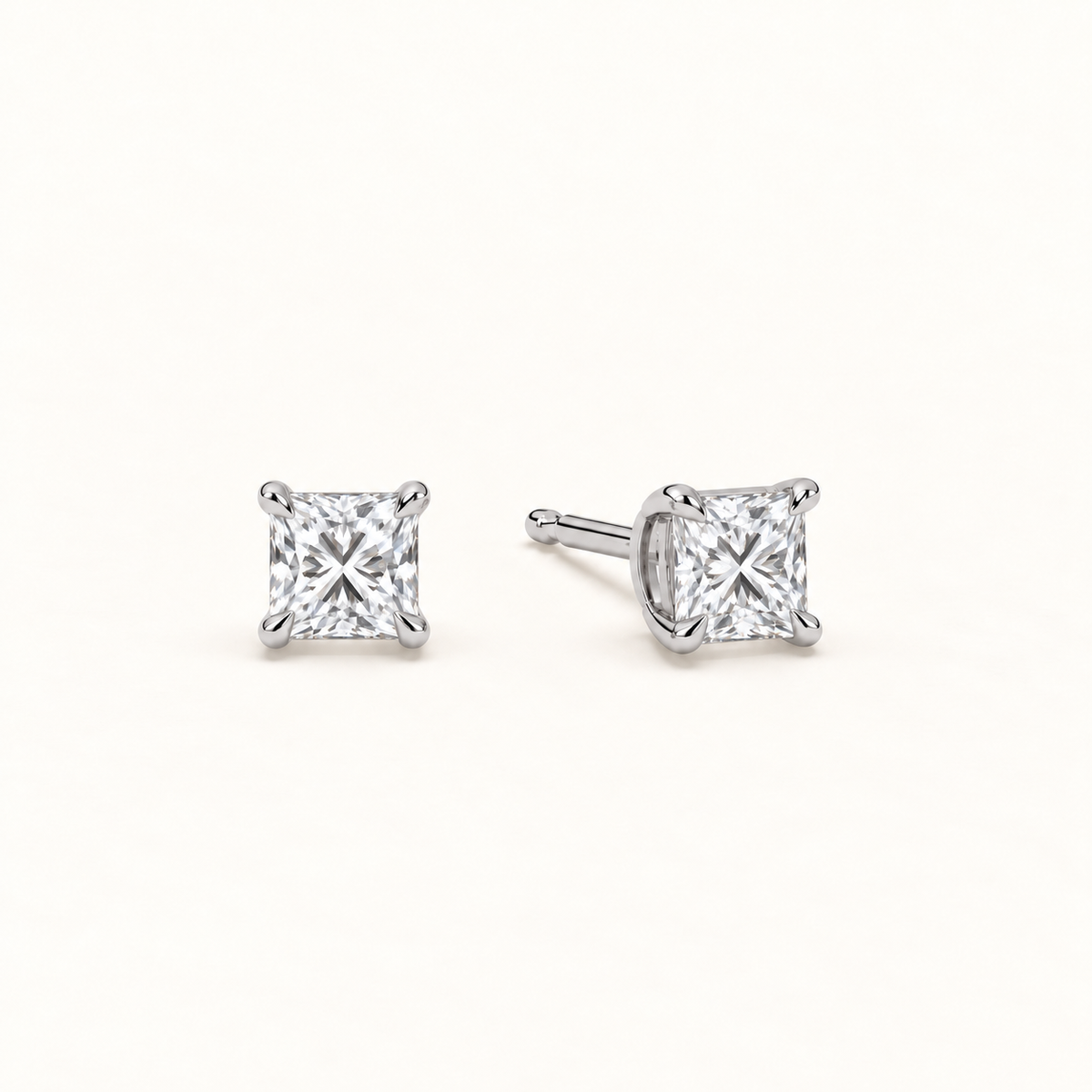 Princess-cut diamond stud earrings, 1 total carat weight, platinum — angled
