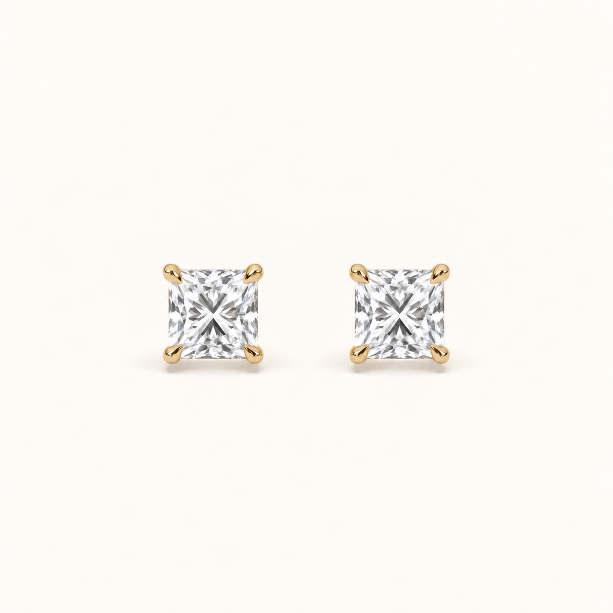 Princess diamond earrings, 1ct total pair weight, yellow gold, view 1