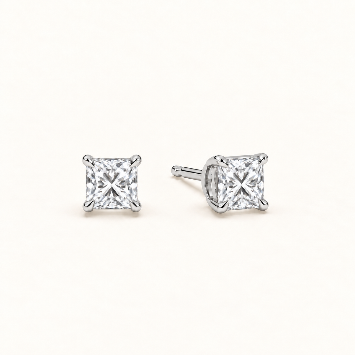 Princess-cut diamond stud earrings, 1.5 total carat weight, platinum — angled
