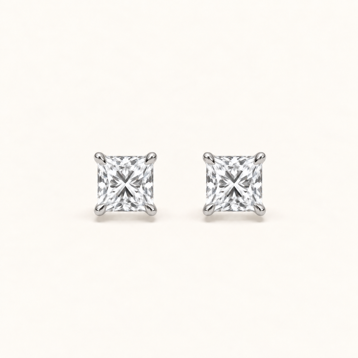 Princess-cut diamond stud earrings, 1.5 total carat weight, platinum — front