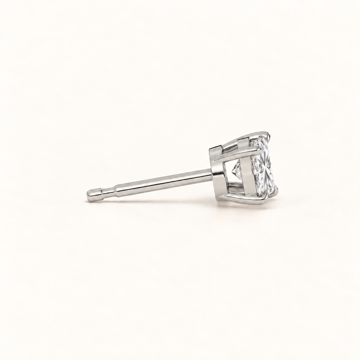 Princess-cut diamond stud earrings, 1.5 total carat weight, platinum — side