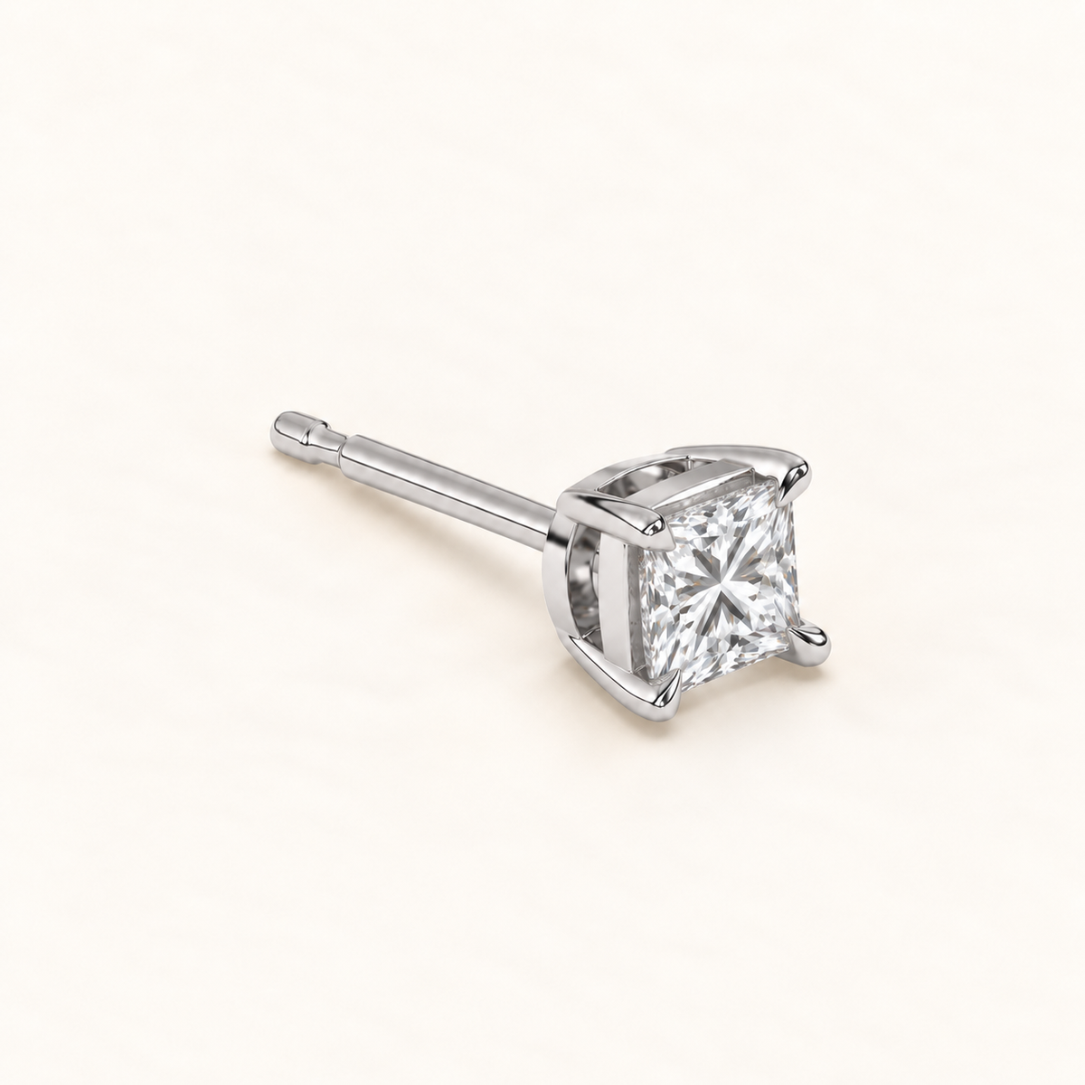 Princess-cut diamond stud earrings, 1.5 total carat weight, platinum — three-quarter