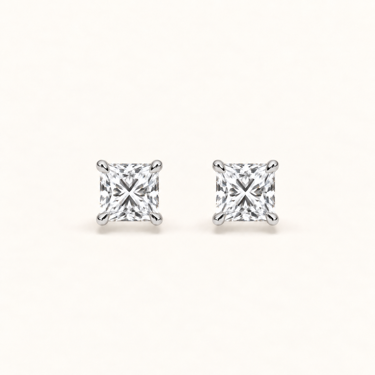 Princess-cut diamond stud earrings, 1.5 total carat weight, white gold — front