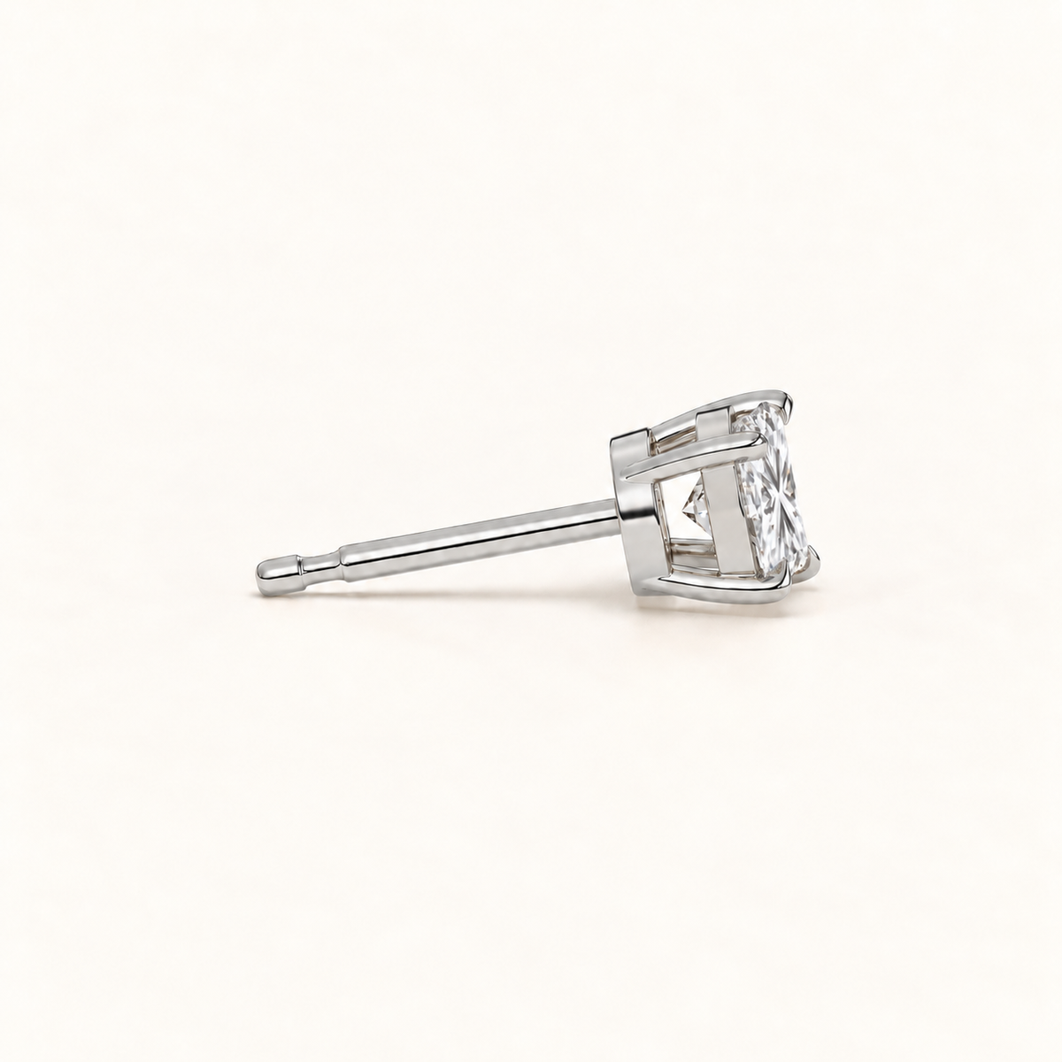 Princess-cut diamond stud earrings, 1.5 total carat weight, white gold — side