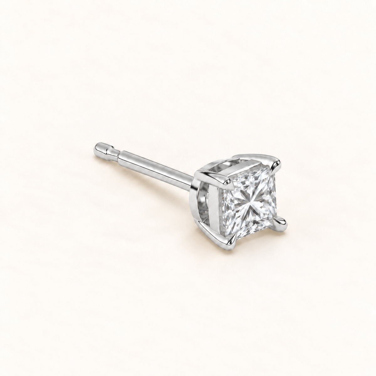 Princess cut diamond earrings, 1.5 total carat weight, white gold, three quarter view