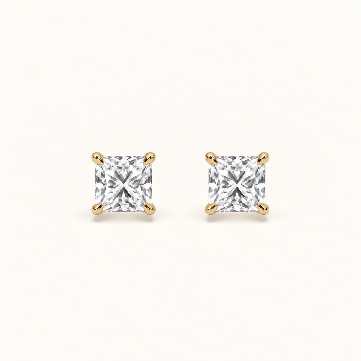 Princess diamond earrings, 1.5ct total pair weight, yellow gold, view 1