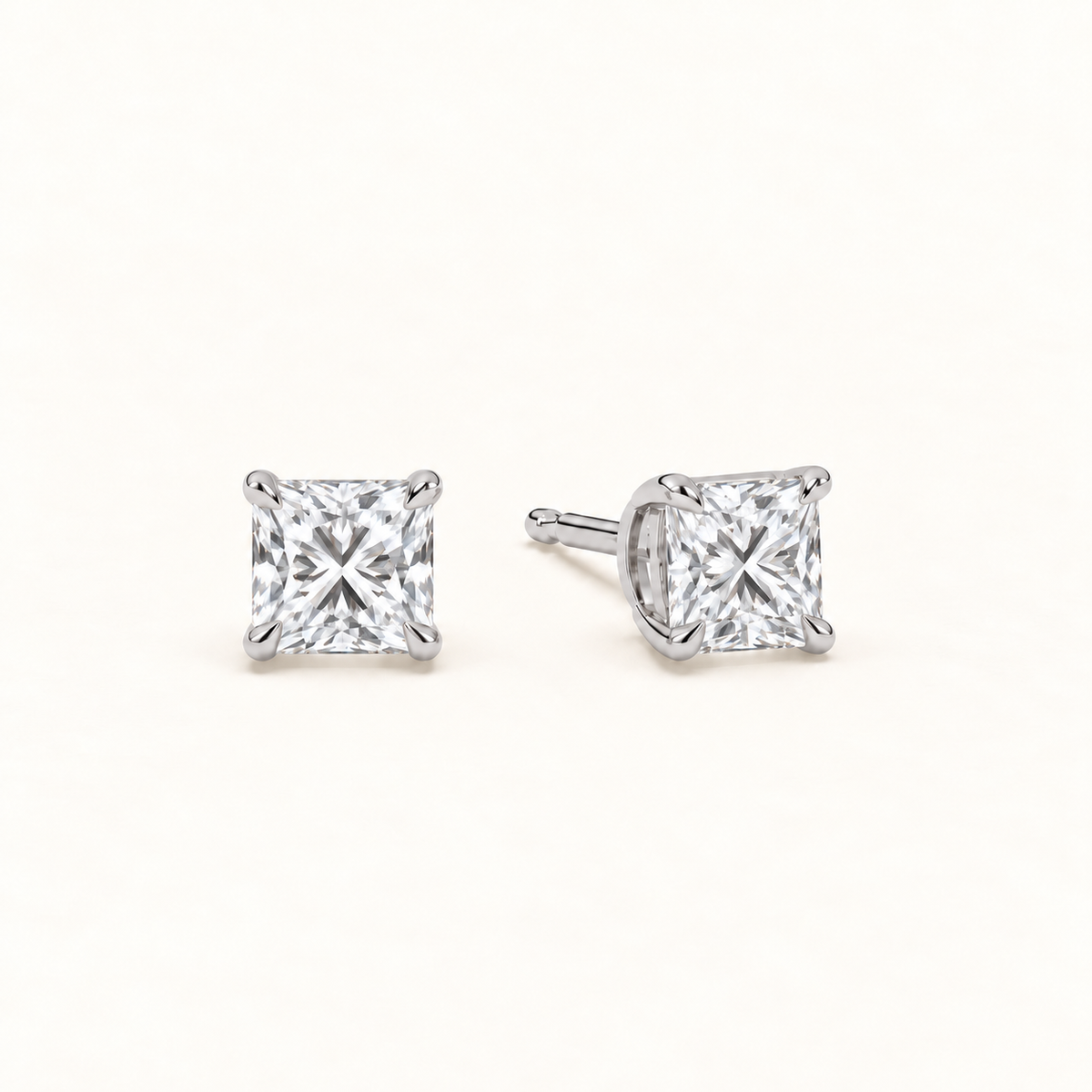 Princess-cut diamond stud earrings, 2 total carat weight, platinum — angled