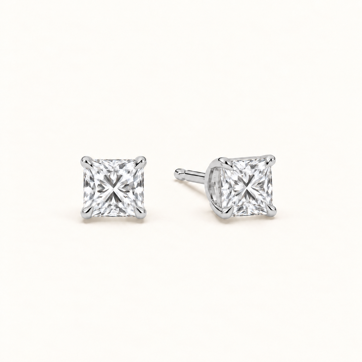 Princess-cut diamond stud earrings, 2 total carat weight, white gold — angled