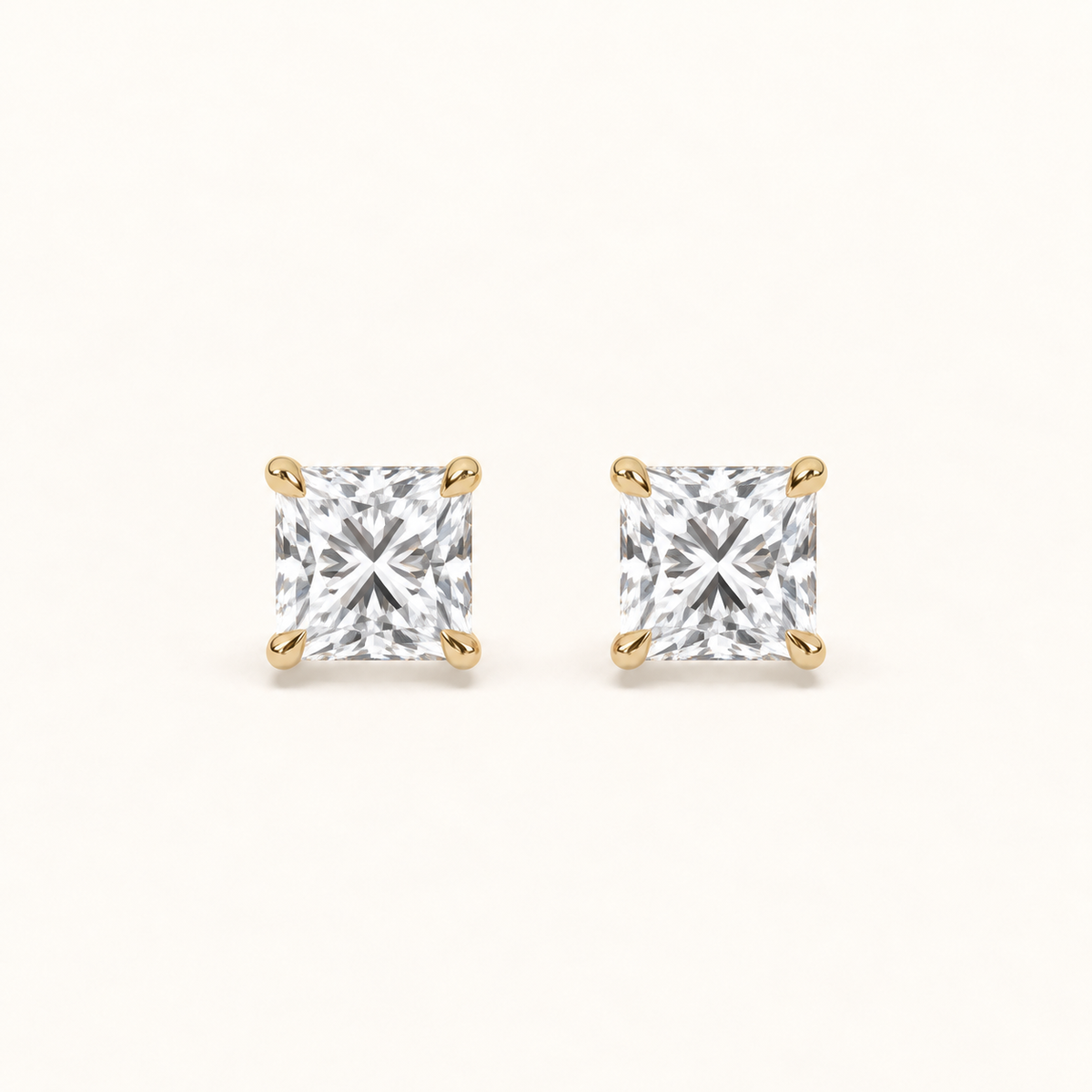 Princess diamond earrings, 2ct total pair weight, yellow gold, view 1