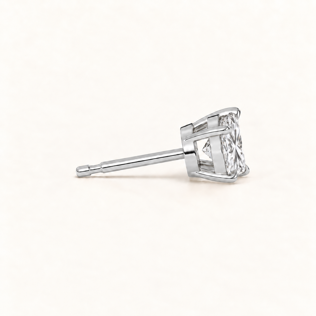 Princess cut diamond earrings, 3 total carat weight, platinum, side view