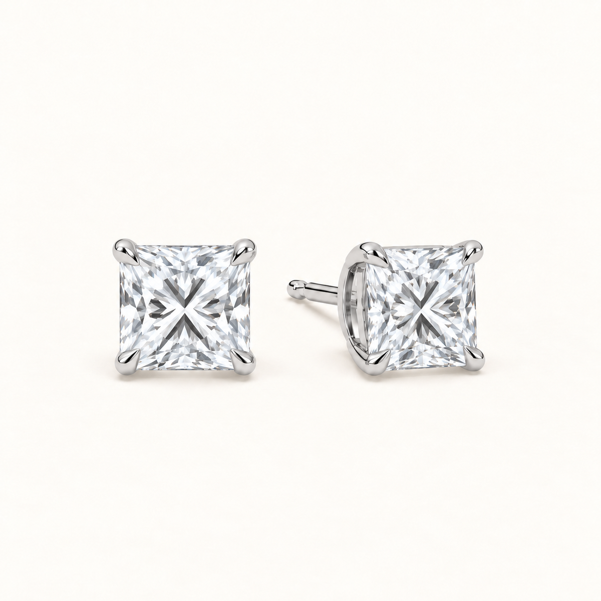 Princess-cut diamond stud earrings, 4 total carat weight, platinum — angled