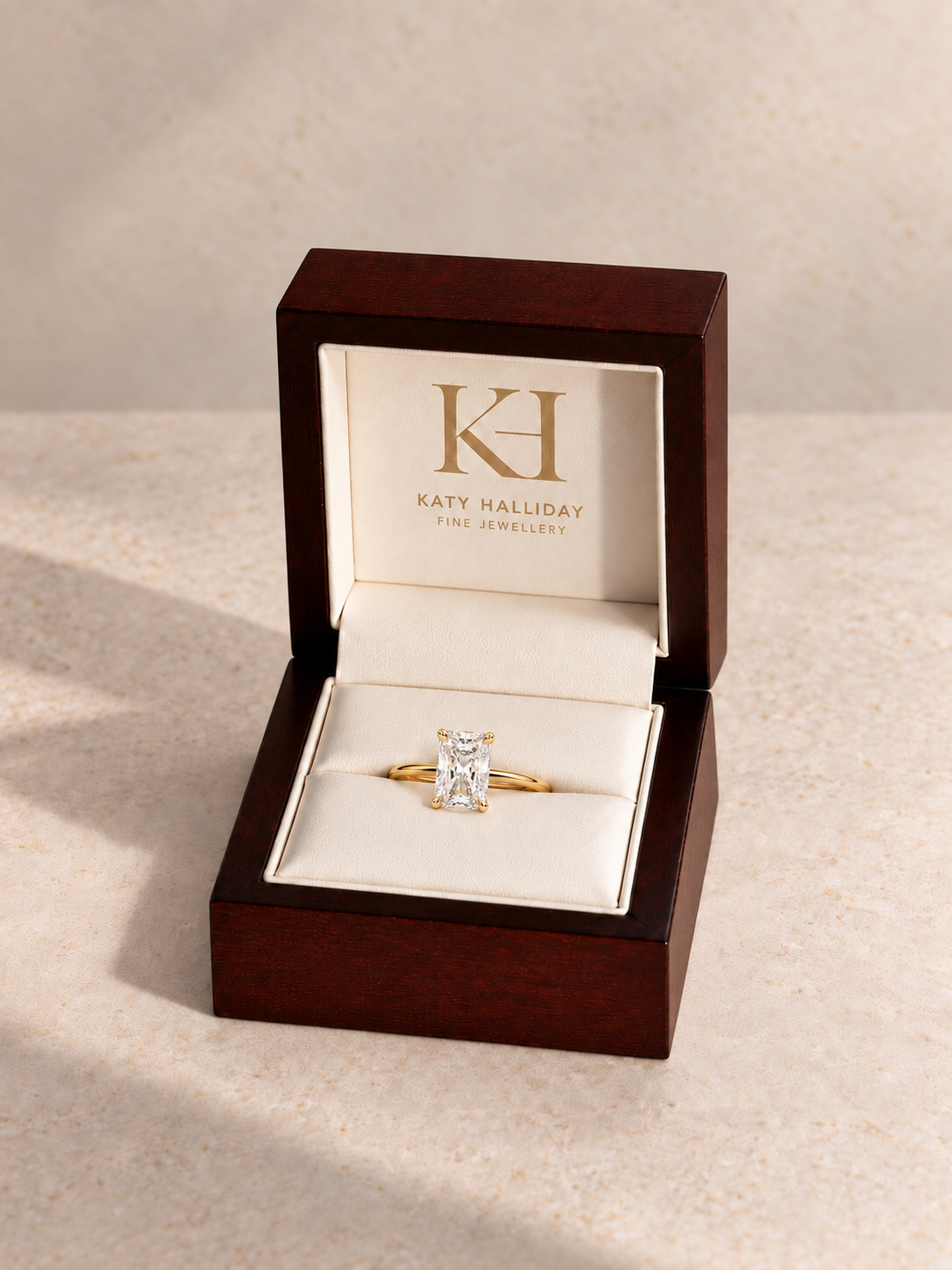 Katy Halliday wooden presentation box with north-south radiant cut solitaire
