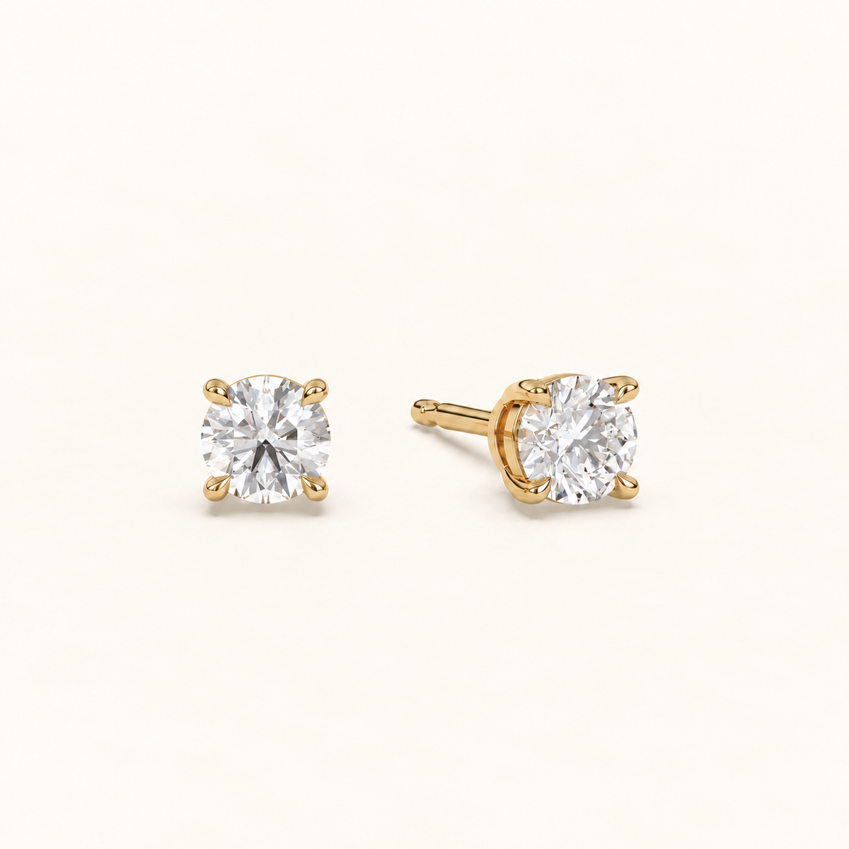 round brilliant studs 1 tcw yellow gold angled