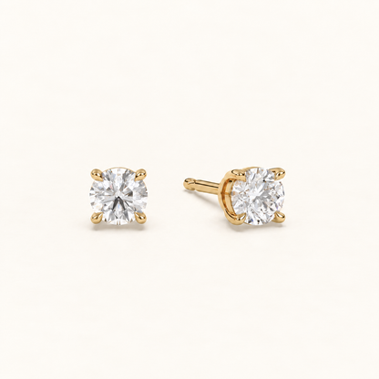 round brilliant studs 1 tcw yellow gold angled