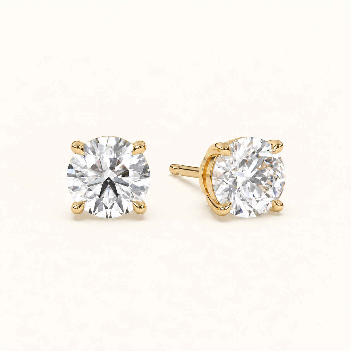 round brilliant studs 4 tcw yellow gold angled
