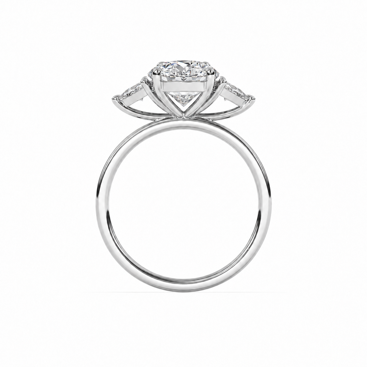 Gallery profile view of oval diamond three-stone ring in white metal