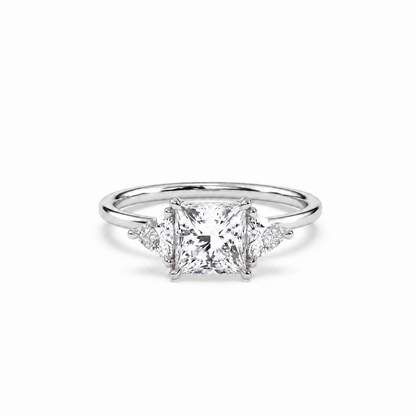 Princess and trillion diamond ring in white metal, lying-down view with approved solitaire shank profile