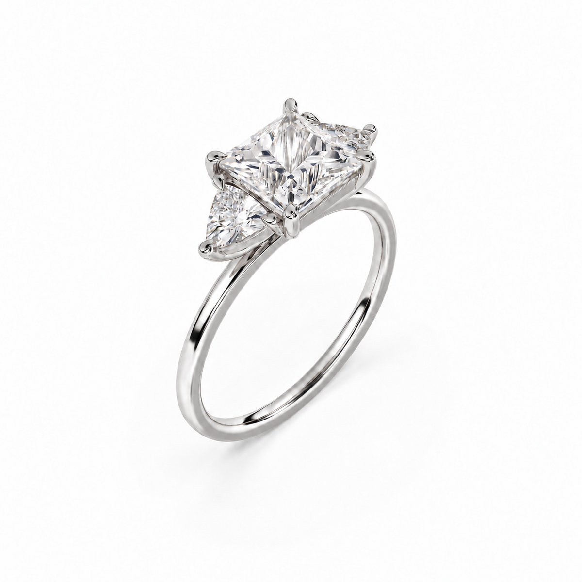 Princess and trillion diamond ring in white metal, three-quarter view with approved solitaire shank profile
