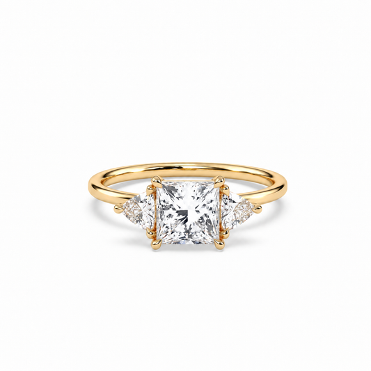 Princess and trillion diamond ring in yellow gold, lying-down view with approved solitaire shank profile